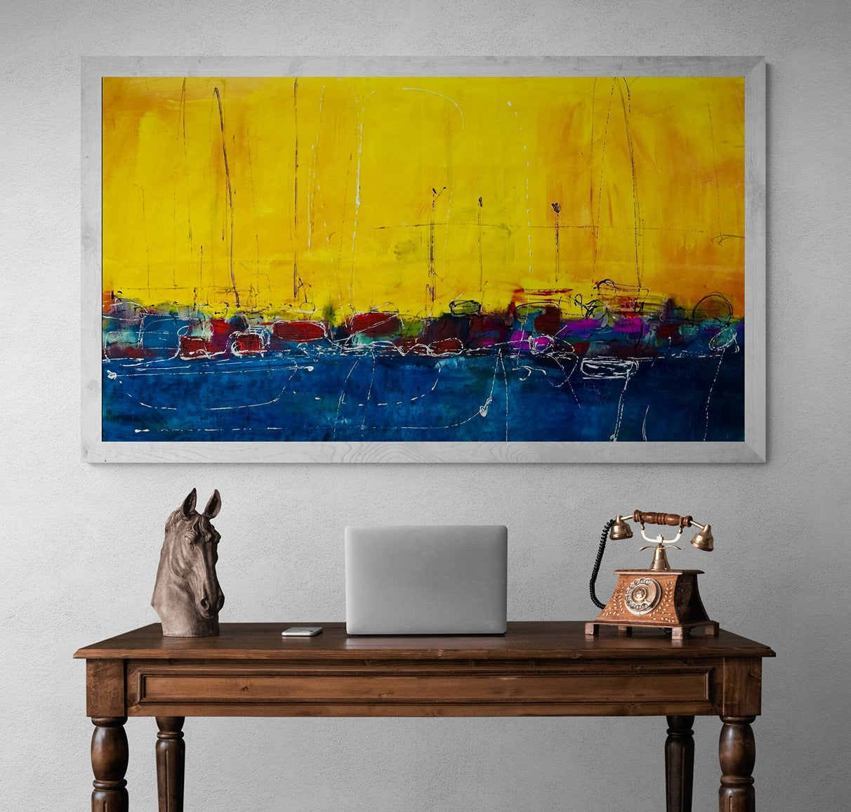 Canvas artwork enhances the vintage charm of the home office setup, adding character and inspiration to the workspace.
