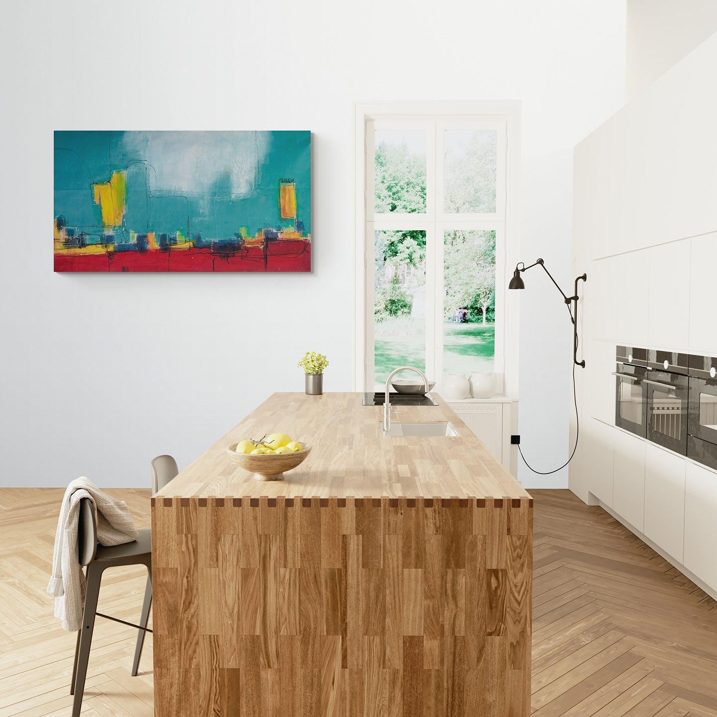 Abstract canvas wall art, hand-painted and original, graces the kitchen, adding a vibrant touch to the space centered around a large wooden island.