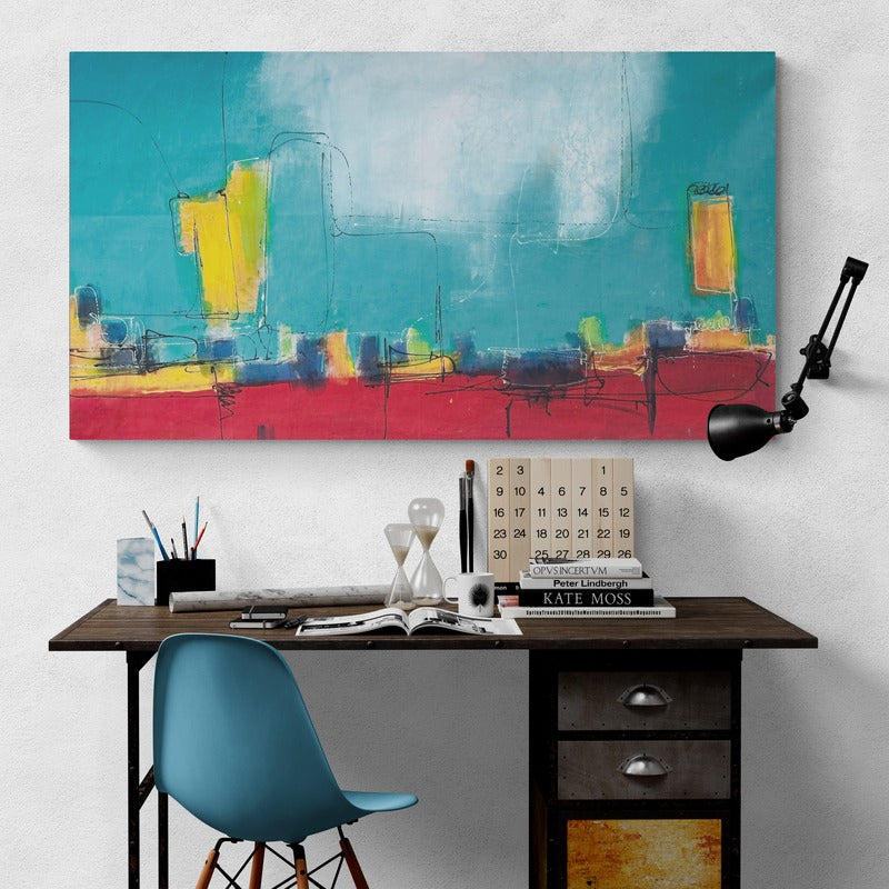 A large original hand-painted abstract canvas wall art embellishes a study area, complementing the ambiance of the desk illuminated by a lamp.