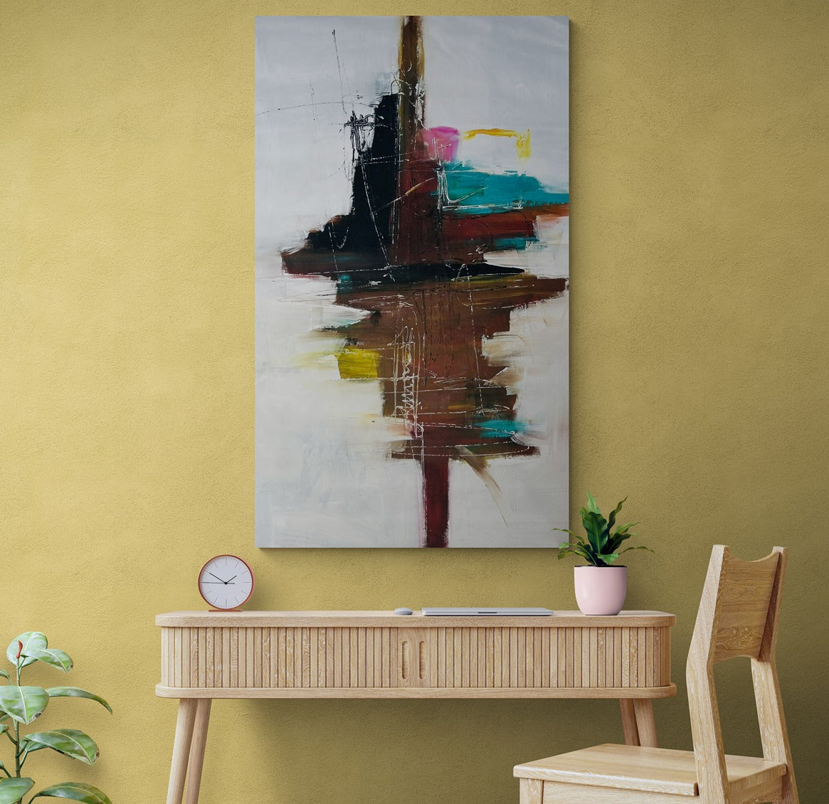Abstract canvas wall art, hand-painted and large in size, hangs above a wooden study desk and chair, enhancing the ambiance of the workspace with creativity and inspiration.