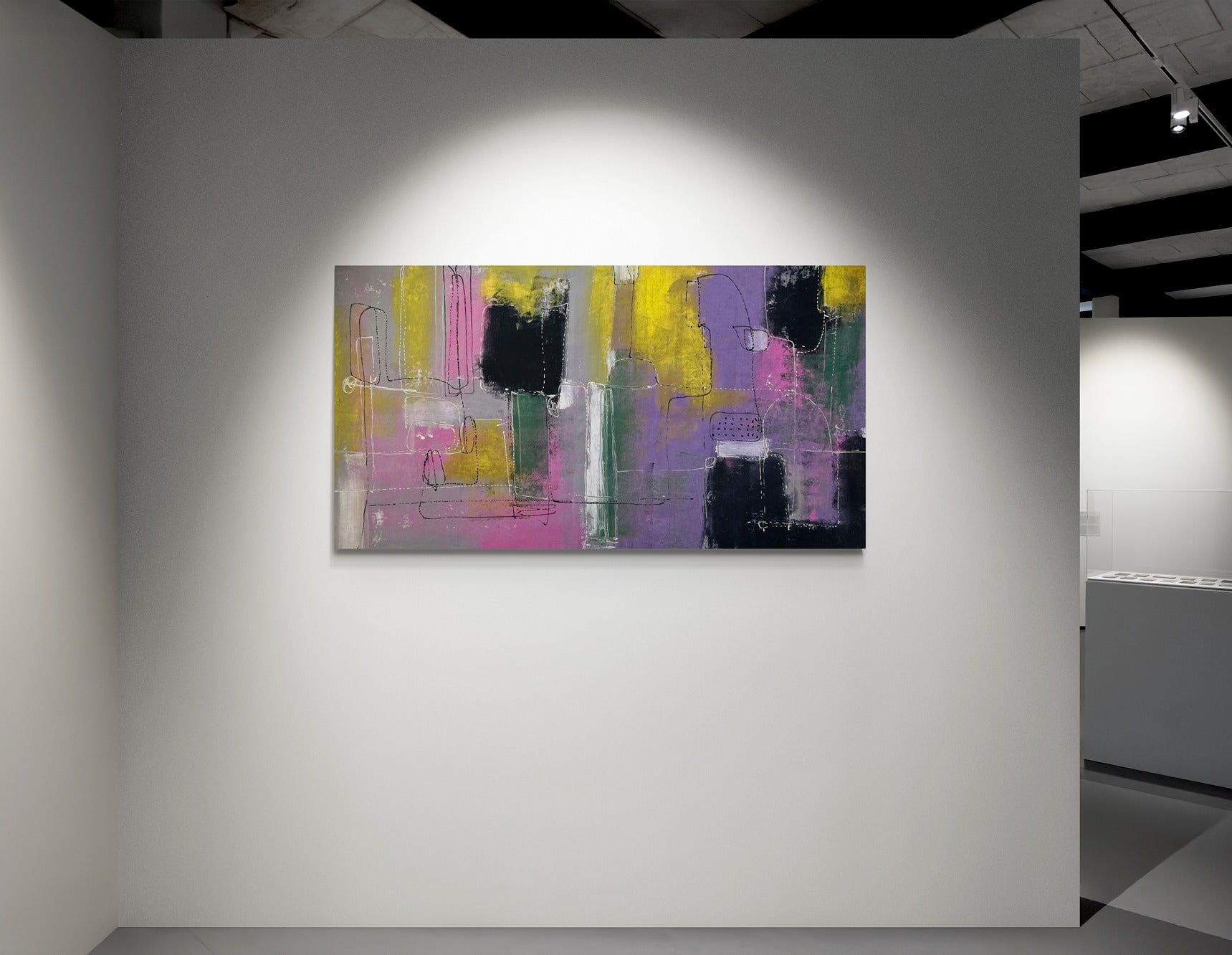 Large abstract hand painted wall art hanging on a white wall in a gallery