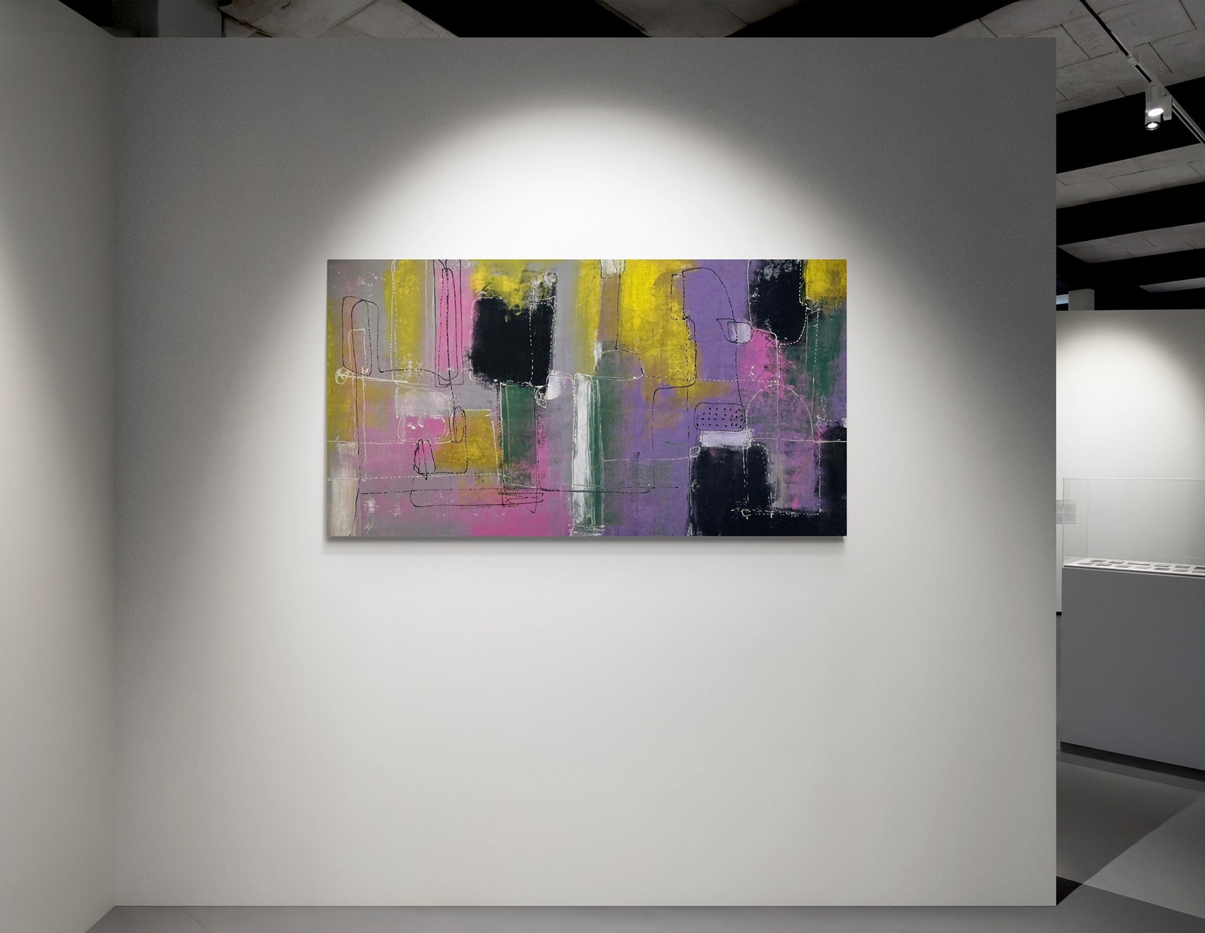 Large abstract hand painted wall art hanging on a white wall in a gallery 