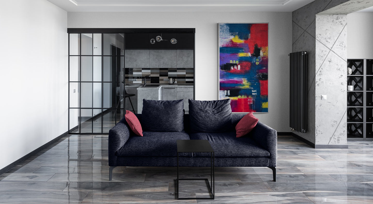 Abstract modern large handpainted wall art inside a luxury modern living room with darke gray sofa