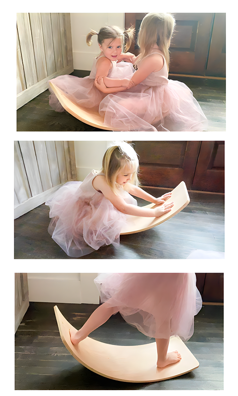 Two girls joyfully playing with the Board-for-balance Wooden Montessori Toy, fostering balance and coordination.