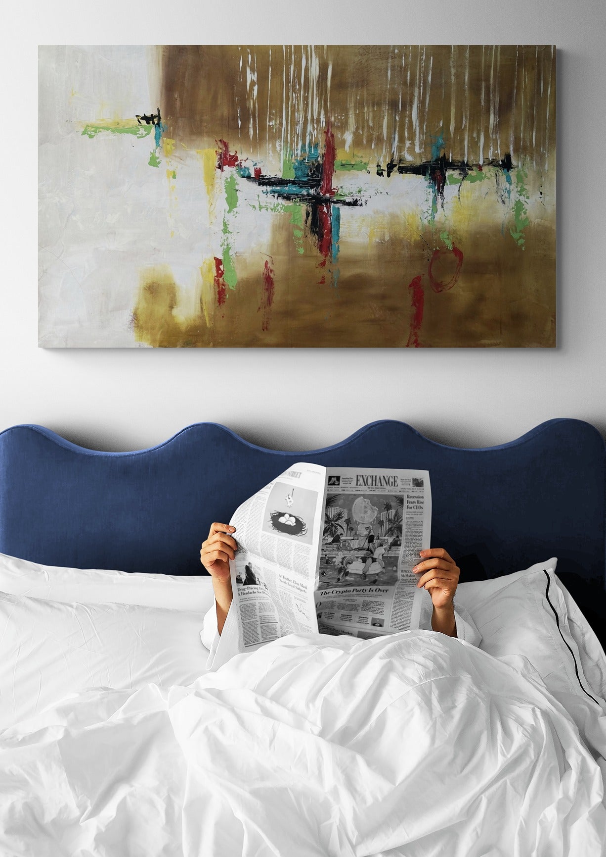 A large painting depicts a man reading a newspaper in bed, adding a touch of relaxation and contemplation to the room's ambiance.