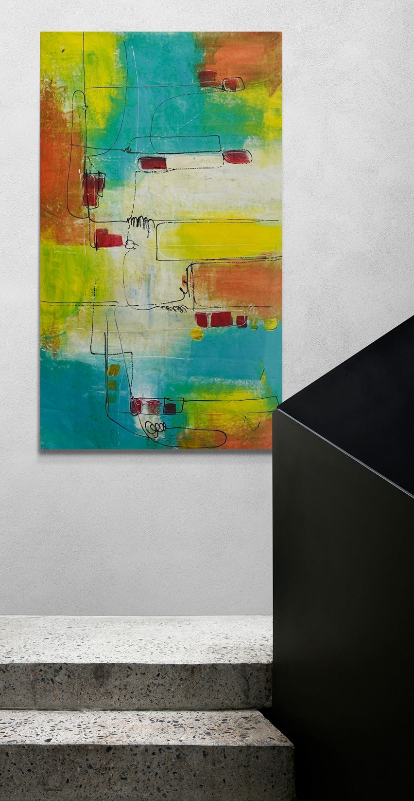 Large original hand-painted abstract canvas wall art adds character to a concrete stairwell, infusing it with artistic flair.