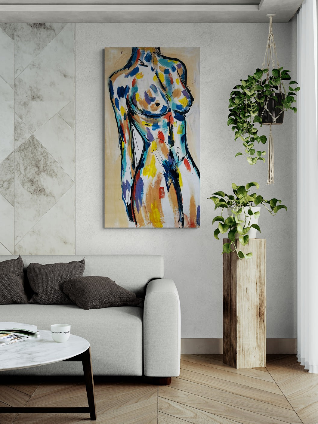 Original hand-painted abstract canvas wall art adorns the living room, alongside a sofa and potted plants, creating a harmonious blend of art and nature in the space.
