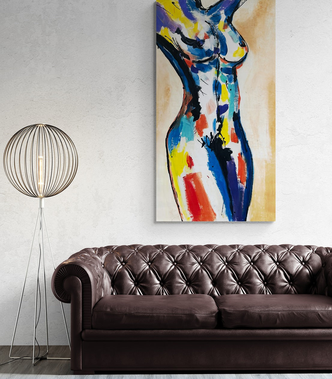 Original hand-painted abstract canvas wall art enriches the ambiance of a lounge adorned with a leather sofa and modern lamp, enhancing the contemporary aesthetic with artistic flair.